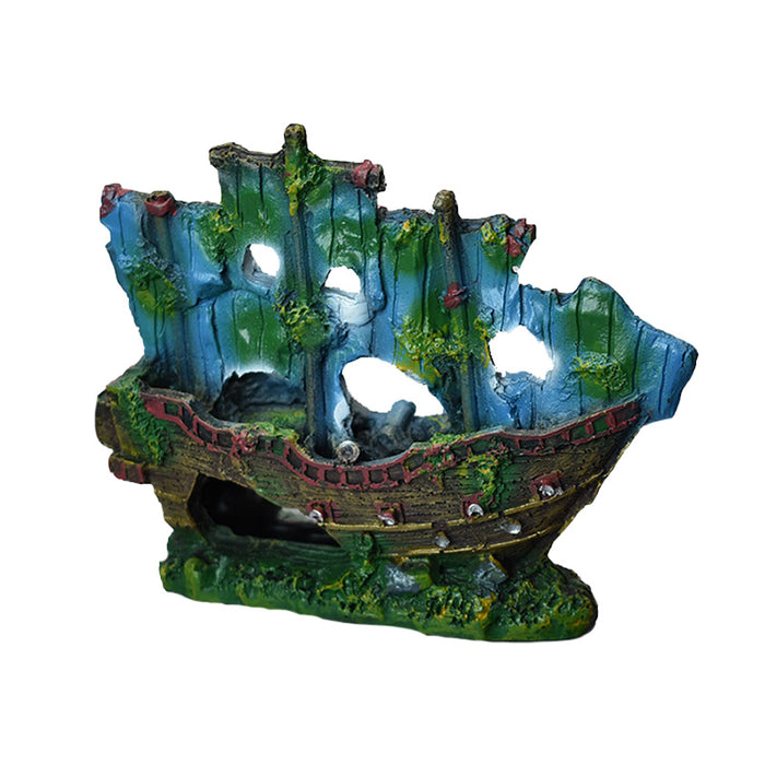 Small aquarium ornament ship with blue sails